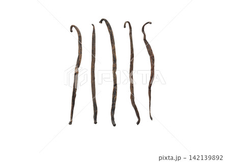 Five dried vanilla pods on white background, isolated on white, PNG Five dried vanilla pods on white background, isolated on white, PNG 142139892