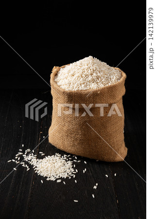 raw Long Grain Sticky Glutinous Rice in Burlap Sack raw Long Grain Sticky Glutinous Rice in Burlap Sack 142139979