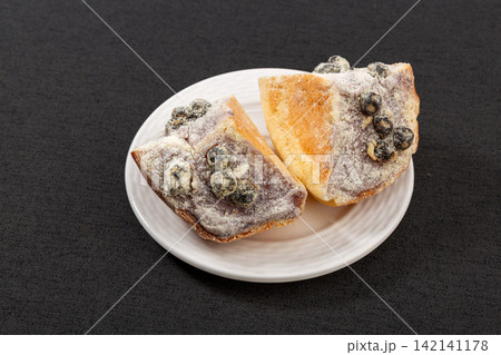blueberry Cream Cheese Bread Halves Dusted With Powdered Sugar blueberry Cream Cheese Bread Halves Dusted With Powdered Sugar 142141178