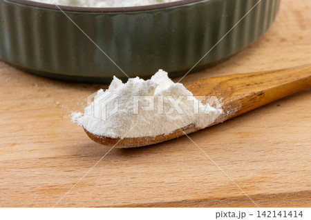 potato Starch Powder on Wooden Spoon Close Up 142141414