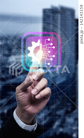 Businness hand touching a glowing digital icon featuring a gear and circuit board design, symbolizing automation, artificial intelligence, and digital transformation. Digital transformation concept Businness hand touching a glowing digital icon featuring a gear and circuit board design, symbolizing automation, artificial intelligence, and digital transformation. Digital transformation concept 142143159