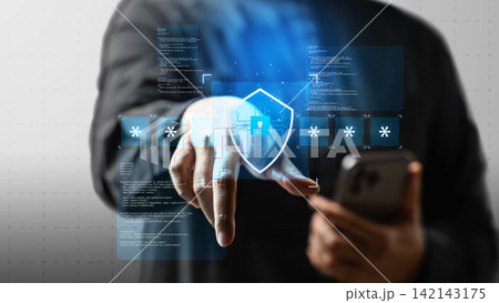 Businessman interacting with a futuristic digital security interface showing a shield and password input on a virtual screen. Concept of multi-factor authentication login 142143175