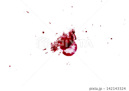 Red blood splatter or ink stain on a clean white background, featuring fine droplets and a central crimson pool. Halloween concept Red blood splatter or ink stain on a clean white background, featuring fine droplets and a central crimson pool. Halloween concept 142143324