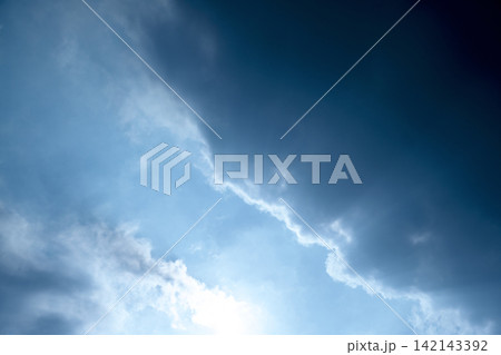 Serene light blue sky with soft, wispy white clouds, creating a peaceful and airy background. Sky or natural background Serene light blue sky with soft, wispy white clouds, creating a peaceful and airy background. Sky or natural background 142143392