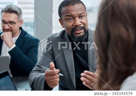 African businessman, feedback and meeting in office for collaboration, teamwork and brainstorming in workplace. Man, ceo and corporate people in group for coaching, advice and mentor for internship African businessman, feedback and meeting in office for collaboration, teamwork and brainstorming in workplace. Man, ceo and corporate people in group for coaching, advice and mentor for internship 142143574