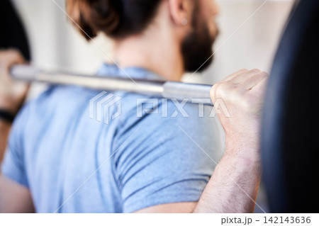 Athletic man, fitness and barbell in gym with heavy weights, lifting and equipment for muscle, wellness and bodybuilding. Male person, active and exercise in workout for training, sports and cardio 142143636