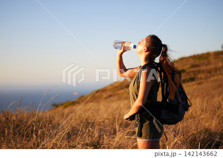Woman, drink water and hiking outdoor for fitness or travel, thirst and hydration with exploring nature. Backpacking, adventure and trekking in New Zealand with h2o drink for nutrition and health Woman, drink water and hiking outdoor for fitness or travel, thirst and hydration with exploring nature. Backpacking, adventure and trekking in New Zealand with h2o drink for nutrition and health 142143662