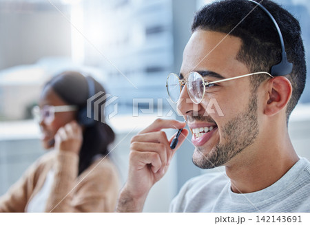 Call center, face and smile with man in telemarketing office for assistance, communication or consulting. Contact, customer service and support with happy young telecom employee in workplace for help 142143691
