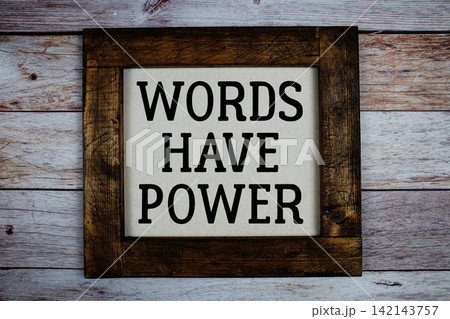 Words Have Power text written on wooden frame top view on wooden background 142143757
