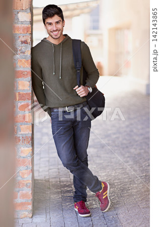 Male student, smile and portrait on college campus or university for education, higher learning or study. Young guy, happy and standing outdoor with bag for educational class with mockup space 142143865