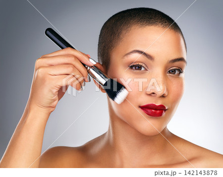Face, brush and portrait of woman with red lips in studio for lipstick and mascara routine. Cosmetics, beauty and female person with facial cosmetology treatment isolated by gray background. Face, brush and portrait of woman with red lips in studio for lipstick and mascara routine. Cosmetics, beauty and female person with facial cosmetology treatment isolated by gray background. 142143878