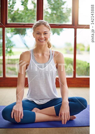 Portrait, yoga or woman in home for ready for meditation, wellness and body flexibility in zen studio. Calm, smile or happy person on mat for mindfulness, lotus pose or balance in pilates session Portrait, yoga or woman in home for ready for meditation, wellness and body flexibility in zen studio. Calm, smile or happy person on mat for mindfulness, lotus pose or balance in pilates session 142143888
