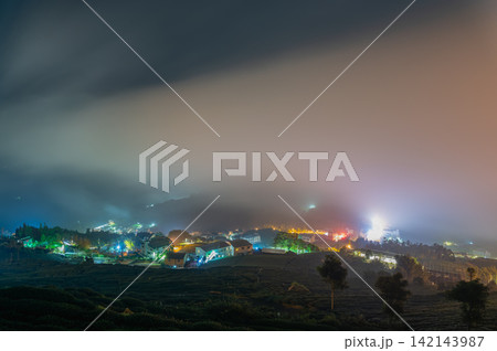 Night View of Shizhuo Tea Plantations and Village in Alishan, Taiwan Night View of Shizhuo Tea Plantations and Village in Alishan, Taiwan 142143987