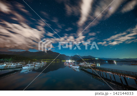Sun Moon Lake night view with starry sky in Taiwan Sun Moon Lake night view with starry sky in Taiwan 142144033