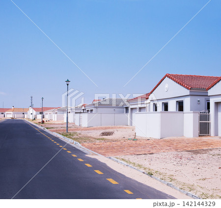 Street, homes and houses in neighborhood, residential area or community in Dallas, Texas in USA. Background, property development or suburban real estate for investment project and society in town Street, homes and houses in neighborhood, residential area or community in Dallas, Texas in USA. Background, property development or suburban real estate for investment project and society in town 142144329