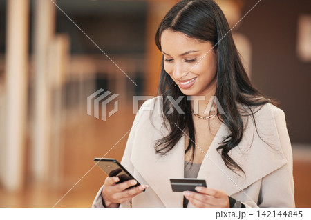 Woman, smartphone and credit card for online shopping, smile and love for retail boutique. Customer, ecommerce and purchase for gift, sale and discount with fashio, store present and service Woman, smartphone and credit card for online shopping, smile and love for retail boutique. Customer, ecommerce and purchase for gift, sale and discount with fashio, store present and service 142144845