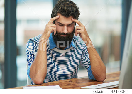 Man, headache and stress at desk for burnout, employee and mental health for debt in office. Male person, creative business and migraine tension or head pain, frustrated and fail or mistake at work Man, headache and stress at desk for burnout, employee and mental health for debt in office. Male person, creative business and migraine tension or head pain, frustrated and fail or mistake at work 142144863