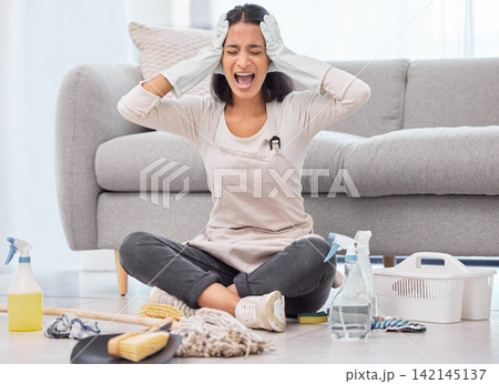 Stress, cleaning and woman screaming with depression in home for hygiene, crisis or mental health challenge. Sad person, housework and tired of chores, shouting and frustrated with anxiety in lounge Stress, cleaning and woman screaming with depression in home for hygiene, crisis or mental health challenge. Sad person, housework and tired of chores, shouting and frustrated with anxiety in lounge 142145137