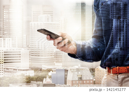Hand, smartphone and man with city overlay for networking or internet browsing for research and schedule project task. Male property developer, double exposure and mobile for business communication. Hand, smartphone and man with city overlay for networking or internet browsing for research and schedule project task. Male property developer, double exposure and mobile for business communication. 142145277