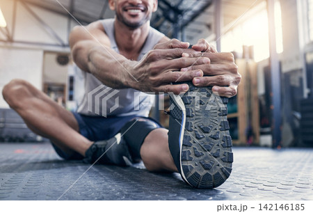 Fitness, foot and man with stretching at gym for exercise, warm up and performance on floor. Health club, training and legs of male person with preparation for workout, flexibility and cardio energy Fitness, foot and man with stretching at gym for exercise, warm up and performance on floor. Health club, training and legs of male person with preparation for workout, flexibility and cardio energy 142146185