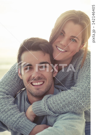 Happy couple, portrait and outdoor piggyback for playful date, relationship or anniversary. Man, woman and face with smile in Australia for holiday winter with fun bonding, connection or traveling Happy couple, portrait and outdoor piggyback for playful date, relationship or anniversary. Man, woman and face with smile in Australia for holiday winter with fun bonding, connection or traveling 142146405