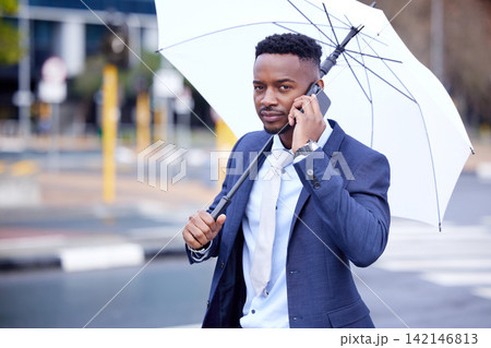 Business, man and phone call or umbrella for finance , outside and financial insurance for safety or security. Assurance, accountability and protection or cover for assets, future and investment 142146813