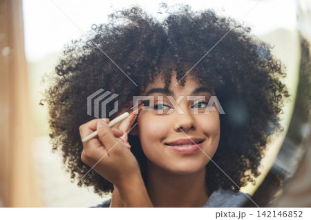 Mirror, eyeshadow or girl in bathroom with brush for morning routine and grooming on reflection in home. Makeup cosmetics, afro or woman with product for natural skincare, beauty glow or wellness Mirror, eyeshadow or girl in bathroom with brush for morning routine and grooming on reflection in home. Makeup cosmetics, afro or woman with product for natural skincare, beauty glow or wellness 142146852