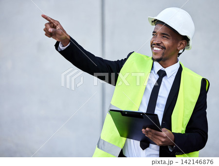 Engineer, black man or architect pointing on site for checklist clipboard for engineering, building in construction. Smile, inspection or contractor in city for development, project or architecture Engineer, black man or architect pointing on site for checklist clipboard for engineering, building in construction. Smile, inspection or contractor in city for development, project or architecture 142146876