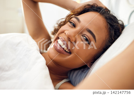 Morning, selfie and portrait of woman in bed with smile for internet, networking or update. Relax, influencer and photography in bedroom with happiness for memory, online content or social media post Morning, selfie and portrait of woman in bed with smile for internet, networking or update. Relax, influencer and photography in bedroom with happiness for memory, online content or social media post 142147756