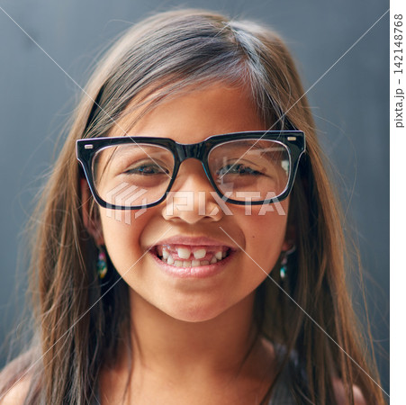 Portrait, glasses and girl in studio with eye care for optometry, prescription and confidence. Smile, kid and frame of spectacles with lens on black background for clear vision, happiness or eyesight Portrait, glasses and girl in studio with eye care for optometry, prescription and confidence. Smile, kid and frame of spectacles with lens on black background for clear vision, happiness or eyesight 142148768