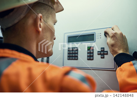 Panel, machine and man in electricity maintenance, engineering and industrial grid inspection. Renewable energy, production and technician checking electrical power system box for quality assurance Panel, machine and man in electricity maintenance, engineering and industrial grid inspection. Renewable energy, production and technician checking electrical power system box for quality assurance 142148848