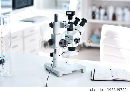 Microscope, lab and science on table for research or development, chemistry or investigation for medical. Magnifier, medicine and test for pharmaceutical or biotechnology, tools for analysis Microscope, lab and science on table for research or development, chemistry or investigation for medical. Magnifier, medicine and test for pharmaceutical or biotechnology, tools for analysis 142149732