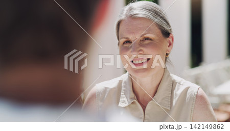 Elderly woman, smile and conversation at house outside, retirement date and patio. Senior couple, care and love on chair in park for communication, bonding and together in summer for old memories 142149862