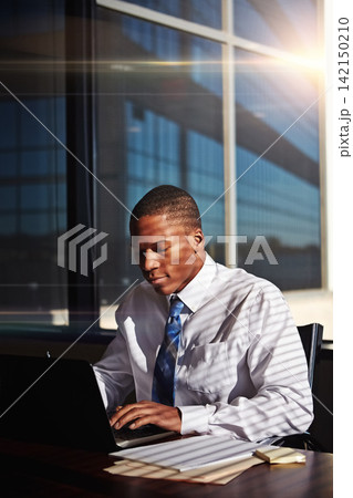 Black man, business and laptop or internet research as investment analyst, planning or financial. Male person, paperwork and corporate professional with growth on forecasting app, online or goals Black man, business and laptop or internet research as investment analyst, planning or financial. Male person, paperwork and corporate professional with growth on forecasting app, online or goals 142150210