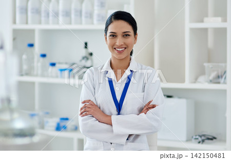 Arms crossed, portrait and smile with science woman in laboratory for innovation or research. Happy, hospital and medicine with confident scientist in lab for breakthrough, discovery or experiment 142150481