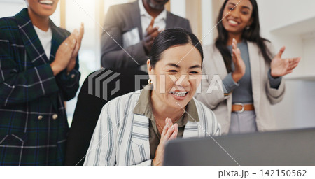 Laptop, happy woman and business people applause, celebration and excited for achievement, winner or success. Group cheers, diversity and team clapping for designer promotion, news or congratulations 142150562