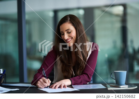 Happy, woman and writing notes in office for admin, brainstorming and planning schedule for internship. Paperwork, documents and girl at desk for creating, project and business report for company Happy, woman and writing notes in office for admin, brainstorming and planning schedule for internship. Paperwork, documents and girl at desk for creating, project and business report for company 142150682