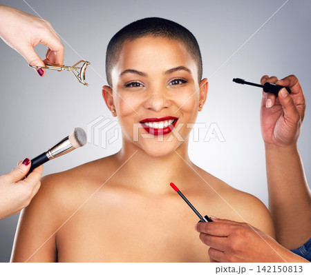 Hands, makeup brushes and portrait of woman with red lips in studio for lipstick and mascara routine. Cosmetics, beauty and face of female person with facial cosmetology treatment by gray background. Hands, makeup brushes and portrait of woman with red lips in studio for lipstick and mascara routine. Cosmetics, beauty and face of female person with facial cosmetology treatment by gray background. 142150813