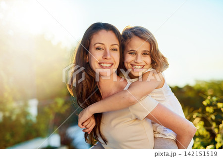Piggy back, outdoor and mother with girl, portrait and bonding together with smile, happiness and nature. Face, single parent and mama carry daughter with fun in garden, sunshine or vacation with joy Piggy back, outdoor and mother with girl, portrait and bonding together with smile, happiness and nature. Face, single parent and mama carry daughter with fun in garden, sunshine or vacation with joy 142151519