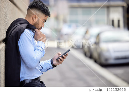 Businessman, reading and relax with phone in city to chat to client and scroll news of stocks. Professional, person and research crypto investment or trader check cellphone with financial info on app 142152666