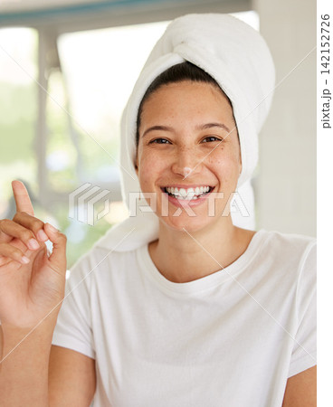 Woman, beauty and cream on nose in morning for portrait, skin and funny with wellness in home bathroom. Girl, person and serum for dermatology, laugh and moisturizer for face with routine in Naples Woman, beauty and cream on nose in morning for portrait, skin and funny with wellness in home bathroom. Girl, person and serum for dermatology, laugh and moisturizer for face with routine in Naples 142152726