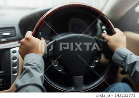 Car, dashboard and hands driving for travel, holiday or roadside adventure. Person, vehicle and steering wheel for transportation, vacation or taxi delivery and professional ride share services Car, dashboard and hands driving for travel, holiday or roadside adventure. Person, vehicle and steering wheel for transportation, vacation or taxi delivery and professional ride share services 142152773