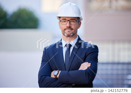 Man, portrait and engineer with arms crossed at building for real estate architecture, property or construction site. Male person, face and project development or employee, supervisor or professional 142152776