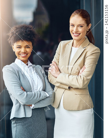 Portrait, happy team and business women with arms crossed together in office for cooperation, diversity or about us. Smile, staff or employee with solidarity, confidence or collaboration of agent Portrait, happy team and business women with arms crossed together in office for cooperation, diversity or about us. Smile, staff or employee with solidarity, confidence or collaboration of agent 142153156