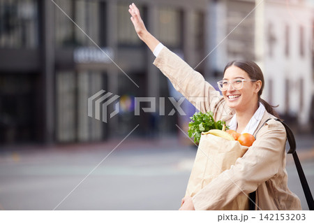Woman, shopping and stop taxi with bag of groceries, food and vegetables for healthy diet in city. Smile, travel and person wave for cab transportation, sales and happy customer calling ride outdoor Woman, shopping and stop taxi with bag of groceries, food and vegetables for healthy diet in city. Smile, travel and person wave for cab transportation, sales and happy customer calling ride outdoor 142153203