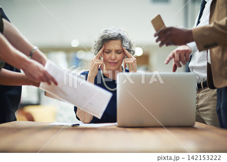 Headache, chaos and business woman in office with documents, report or admin crisis on laptop. Senior manager, boss or CEO with stress, overwhelmed and tired for multitasking or staff time management Headache, chaos and business woman in office with documents, report or admin crisis on laptop. Senior manager, boss or CEO with stress, overwhelmed and tired for multitasking or staff time management 142153222