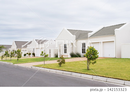 Street, house and houses in neighborhood, community or residential area in Dallas, Texas in USA. Background, property development or suburban homes for investment project or society in quiet town Street, house and houses in neighborhood, community or residential area in Dallas, Texas in USA. Background, property development or suburban homes for investment project or society in quiet town 142153323