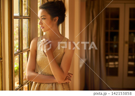 Fashion, window and woman in vintage home for gala event in style, classy outfit and formal clothes. Wealth, aesthetic and person with confidence, pride and luxury in elegant manor, house and mansion 142153858