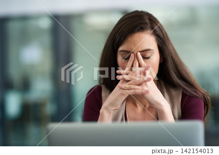 Woman, office and stress with laptop for research at company with deadline or overtime for career growth. Female person, employee and tired or exhausted in desk with pc at work as hr manager 142154013