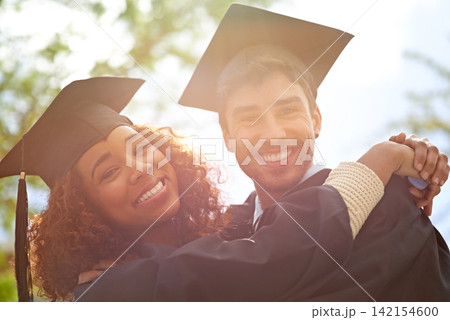 Couple of friends, university and happy for graduation on campus with celebration, success and completion for qualification. Portrait, college and classmate with smile or confident with hug and joy Couple of friends, university and happy for graduation on campus with celebration, success and completion for qualification. Portrait, college and classmate with smile or confident with hug and joy 142154600